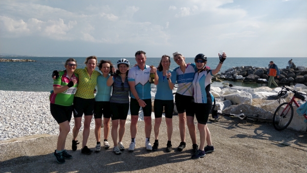 Leaders celebrating at the coast