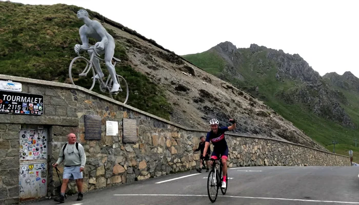 A rider reaching the summit of the Col du Tourmalet